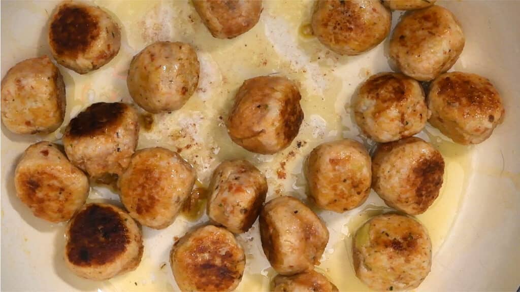 close up on a pan of chicken meatballs
