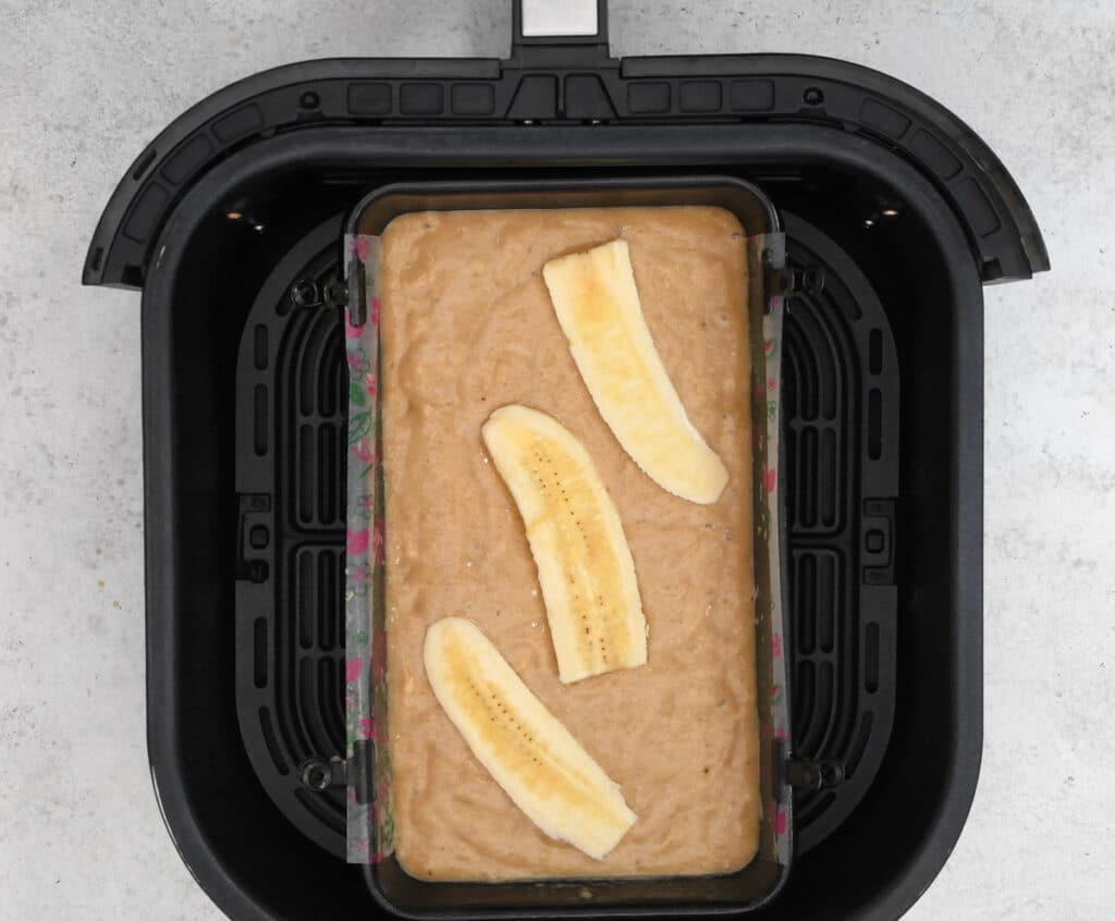banana bread in the basket of an air fryer