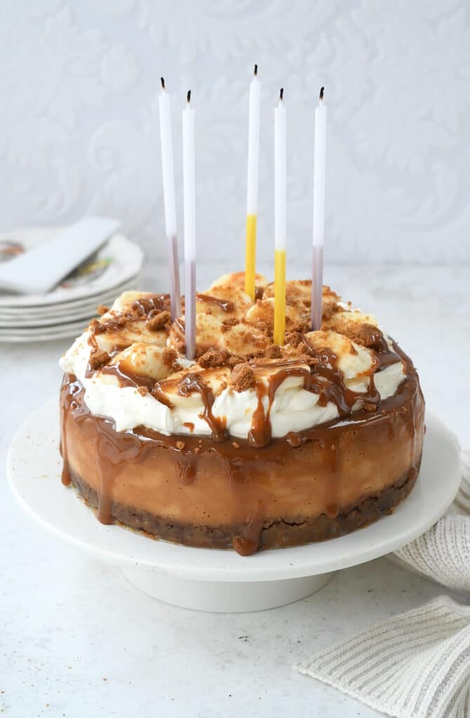 Baked banoffee cheesecake with blown out candles