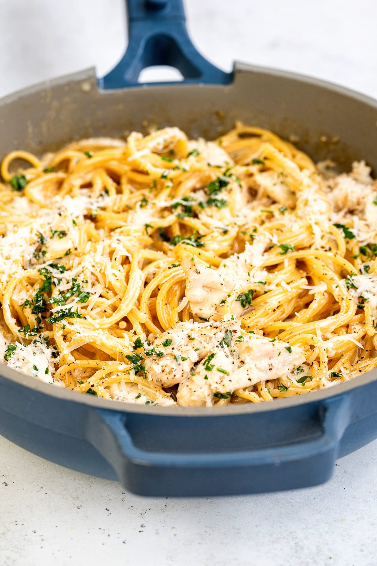 side view of a pan of Garlic parmesan chicken pasta