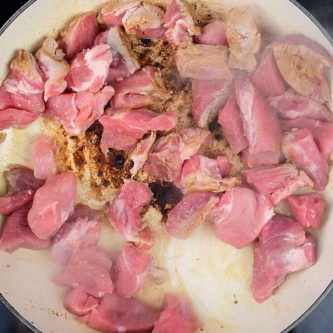 Browning pork in a casserole