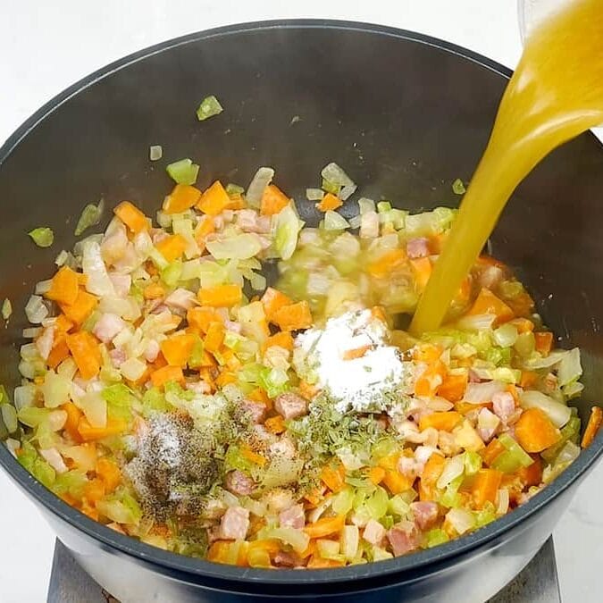 Making turkey pie filling in a pot