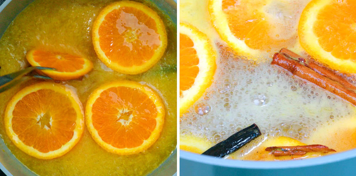 Slices of orange and cinnamon sticks simmer in bubbling liquid in a pot, viewed close-up, with vibrant orange and yellow hues.
