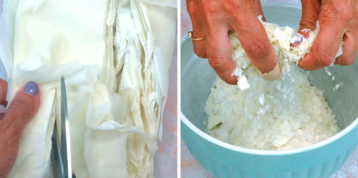 Close-up of hands cutting phyllo dough with scissors on the left; on the right, hands crumble the dough into a blue bowl.