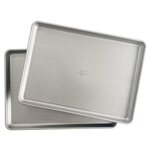 Two USA Pan nonstick half sheet baking pans, on a white background.