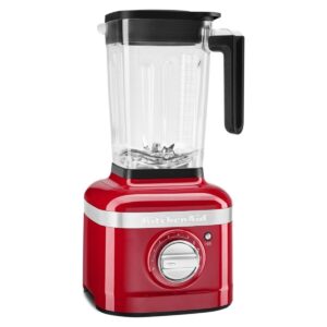 Red KitchenAid K400 countertop blender with a glass jar, on a white background.