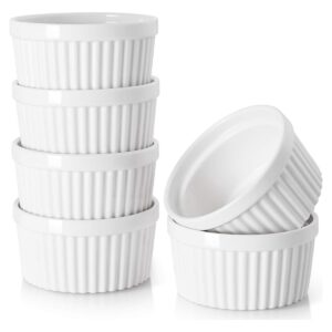 Set of six white 6-ounce ceramic ramekins, on a white background.