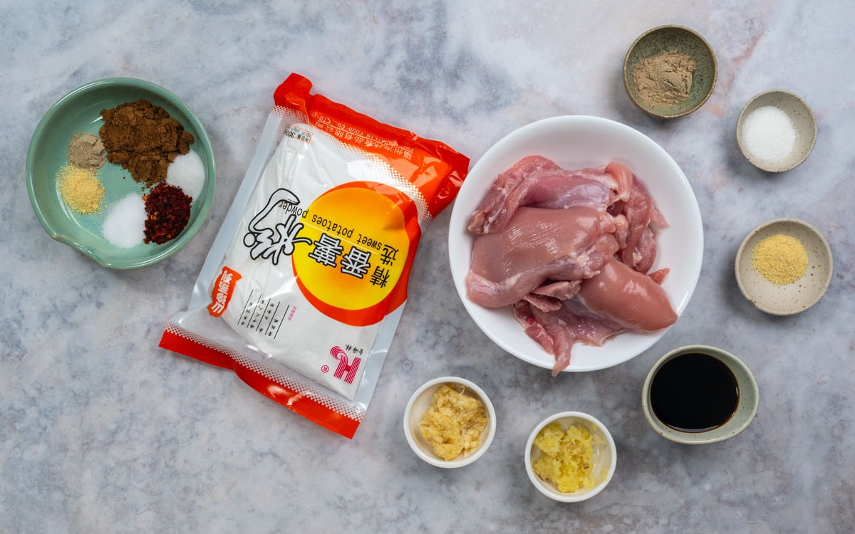 Ingredients for Taiwanese fried chicken: chicken thighs, sweet potato starch, soy sauce, five spice, garlic and ginger